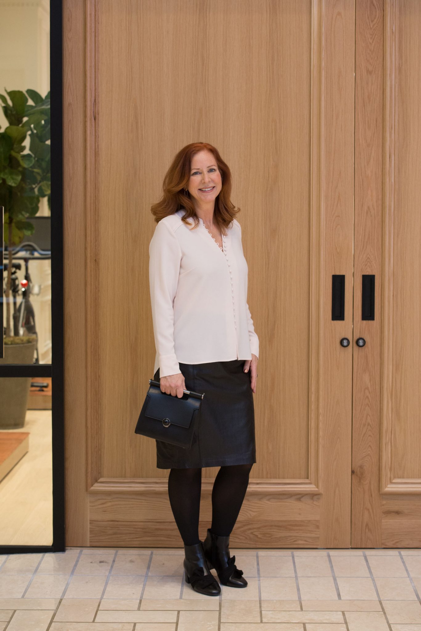 black leather skirt and black top